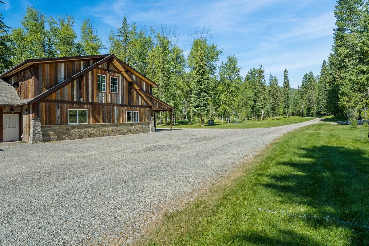 Peaceful Meadow Home and its drive, with the meadow beyond